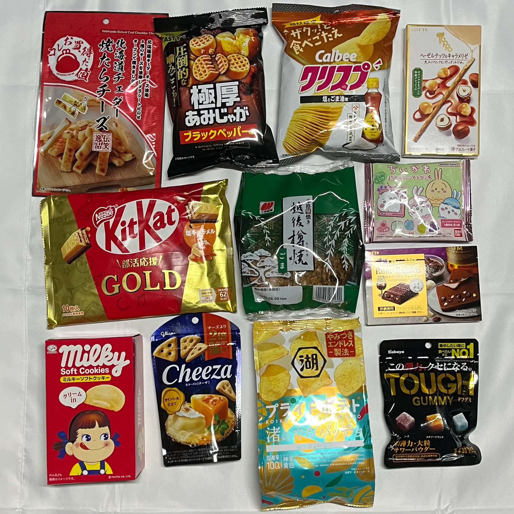 Selection of previous Japanese snack boxes offered by Kashi Shrine.